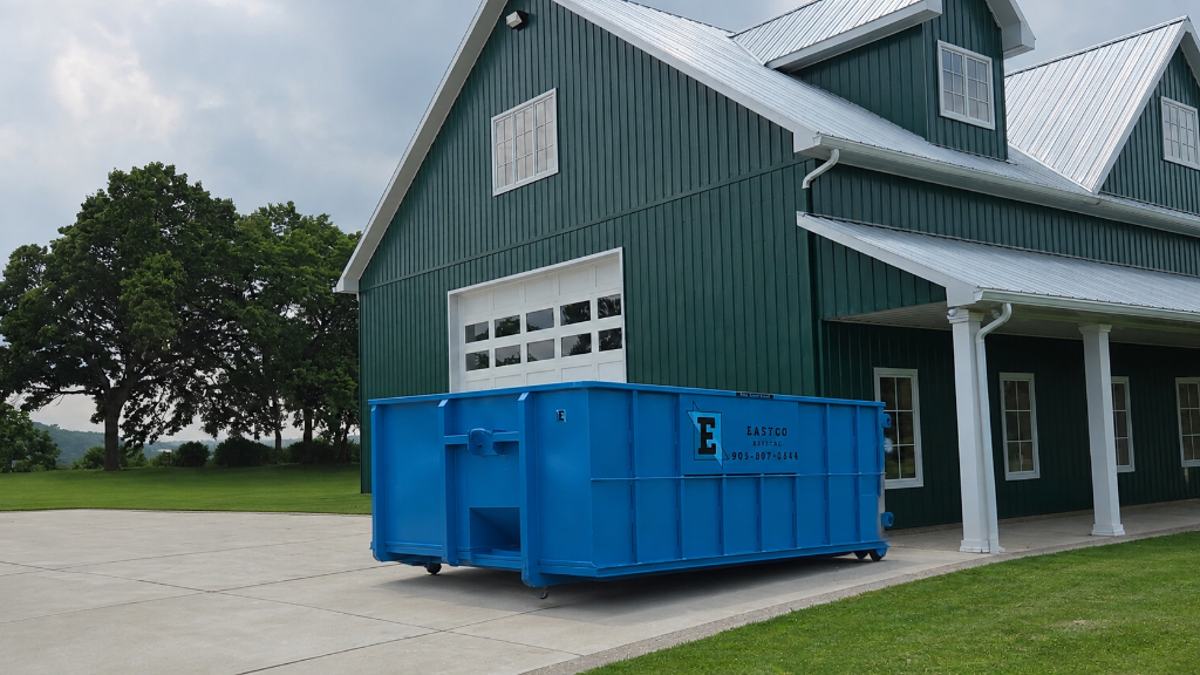 Eastco Hauling roll-off bin delivered at a home