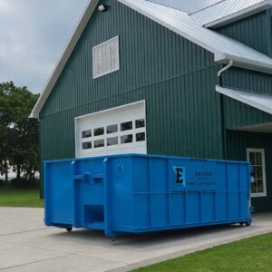 Eastco Hauling 20 yard roll-off bin on a residential driveway