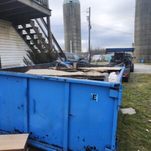 Eastco Hauling 40 yard roll-off bin on a job site